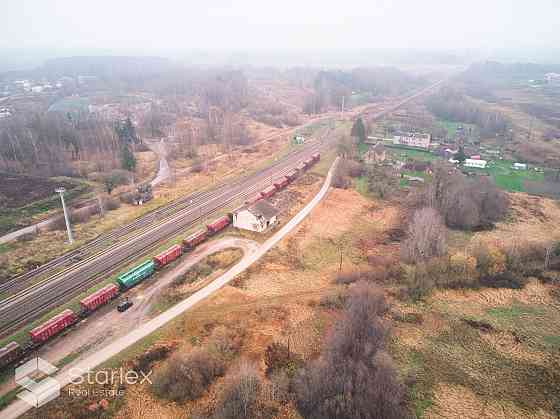 Pārdod 2 zemes gabalus ar kopējo platību 5790 m2 Iecavas dzelzceļa stacijas teritorijā. Viens no zem Бауска и Бауский край