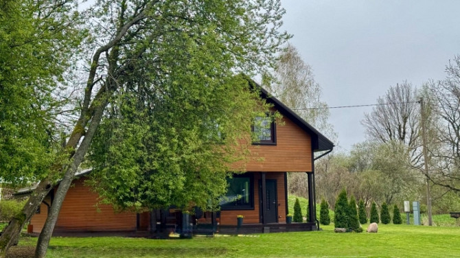 Piedāvājumā  kvalitatīvi būvēta māja pie Babītes ezera pirmajā līnijā. Apvieno komfortu, Rīgas rajons - foto 1