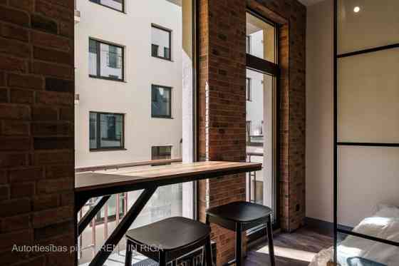 A modern and meticulously designed studio apartment is available for purchase at Ernesta Birznieka-U Rīga
