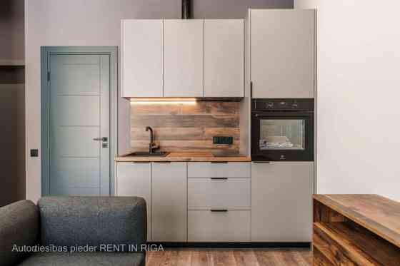 A modern and meticulously designed studio apartment is available for purchase at Ernesta Birznieka-U Rīga