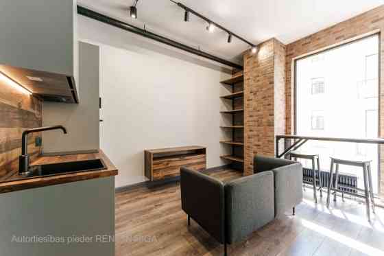 A modern and meticulously designed studio apartment is available for purchase at Ernesta Birznieka-U Rīga