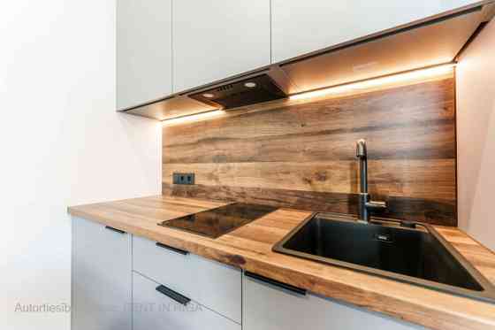 A modern and meticulously designed studio apartment is available for purchase at Ernesta Birznieka-U Rīga