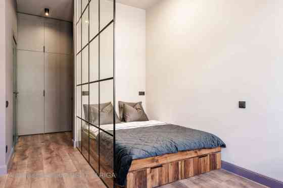 A modern and meticulously designed studio apartment is available for purchase at Ernesta Birznieka-U Rīga