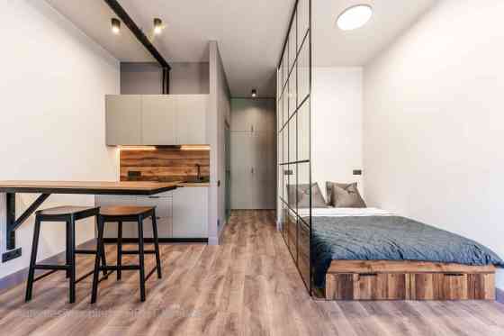 A modern and meticulously designed studio apartment is available for purchase at Ernesta Birznieka-U Rīga