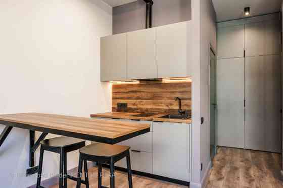 A modern and meticulously designed studio apartment is available for purchase at Ernesta Birznieka-U Rīga