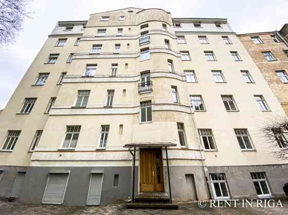 Apartment in a Renovated Pre-War Building.  Property highlights:  Bright apartment with large window Rīga
