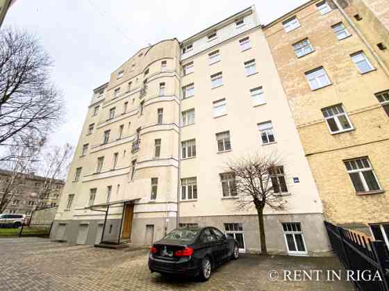 Apartment in a Renovated Pre-War Building.  Property highlights:  Bright apartment with large window Rīga