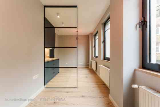 A modern and meticulously designed studio apartment is available for purchase at Ernesta Birznieka-U Rīga