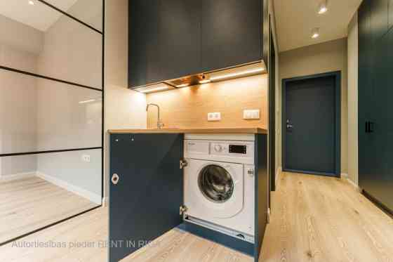 A modern and meticulously designed studio apartment is available for purchase at Ernesta Birznieka-U Rīga