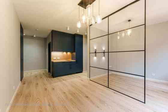A modern and meticulously designed studio apartment is available for reservation at Ernesta Birzniek Rīga