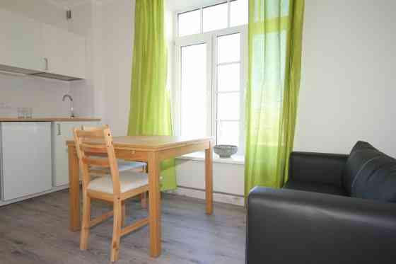 Furnished two rooms apartment on the Aleksandra Caka street, opposite the Center sports quarter.  Ad Рига