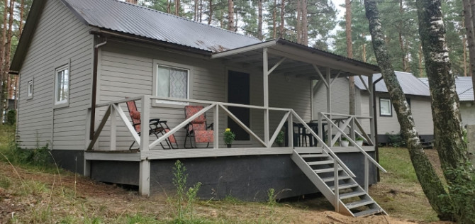Pārdod zemi Lielupes krastā ar divām jaunām mājiņām -  vasarnīcu 50m2 un viesu namiņu Jūrmala - foto 1