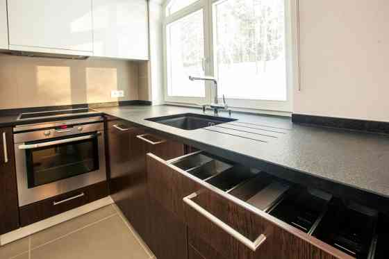 A small, tastefully arranged house with individual heating in a closed village in Mežaparka..  + qua Rīga