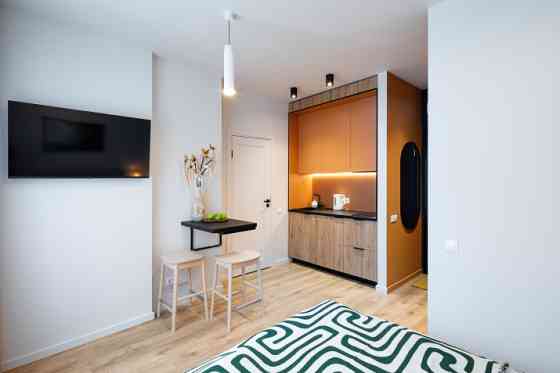 A modern and meticulously designed studio apartment is available for reservation at Ernesta Birzniek Rīga