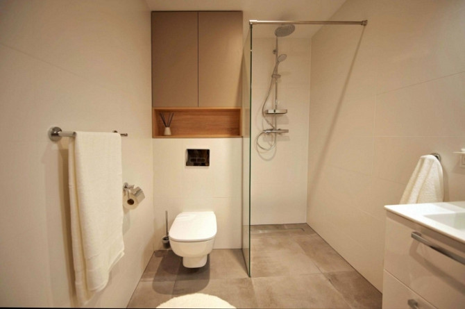 Tiek piedāvāts kvalitatīvs un pilnībā mēbelēts divistabu dzīvoklis jaunā projektā Rīgas Rīga - foto 9