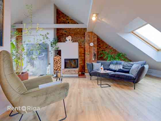 Просторная мансардная квартира с высокими потолками, большой террасой и видом на Rīga