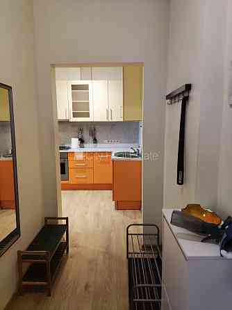 Здание во дворе, реновированный дом, благоустроенная озеленённая территория, Rīga