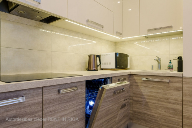 Элегантная и просторная 3-комнатная квартира "Упиша Пасажа"  Она расположена в Рига - изображение 4