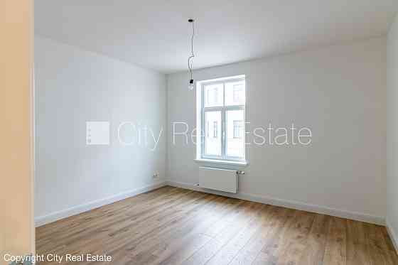 Реставрированный дом, фасад с деревянной отделкой, энергоэффективный дом, Rīga