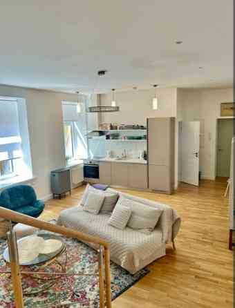 тильная, полностью оборудованная квартира в самом центре Риги, напротив Нового Rīga