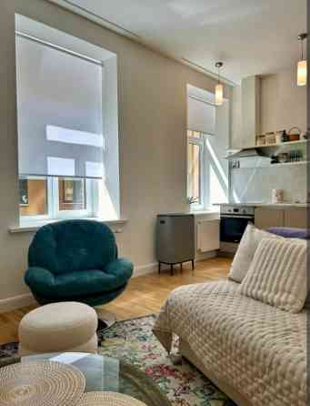 тильная, полностью оборудованная квартира в самом центре Риги, напротив Нового Rīga