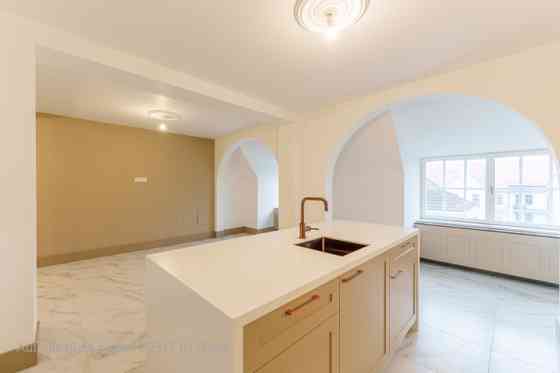 An elegant Art Nouveau building at 7 Ausekļa Street is located in the most prestigious part of the Q Рига