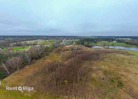 Предлагается к покупке земельный участок вдоль шоссе A1.  + Часть участка Адажский округ