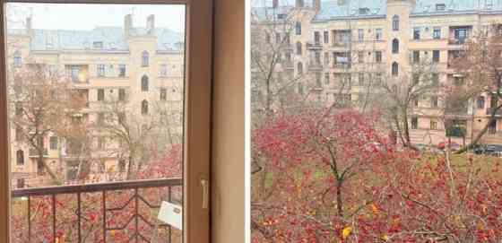 A two-room apartment with separate rooms, a balcony, and a parking space.  The apartment is fully fu Рига