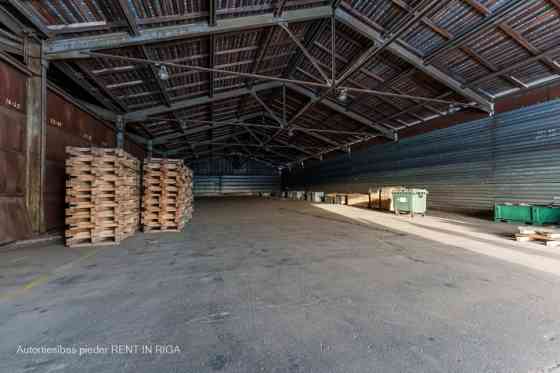 Warehouse No. 20 in the industrial area at 24 Braslas Street.  A metal hangar with one large space m Рига