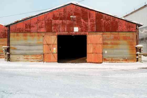 Warehouse No. 20 in the industrial area at 24 Braslas Street.  A metal hangar with one large space m Рига