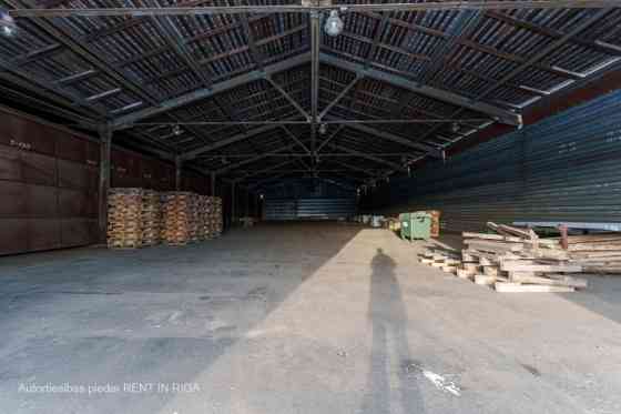Warehouse No. 20 in the industrial area at 24 Braslas Street.  A metal hangar with one large space m Рига