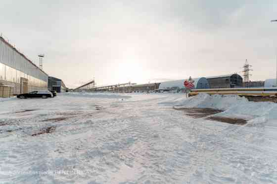 Warehouse No. 20 in the industrial area at 24 Braslas Street.  A metal hangar with one large space m Рига
