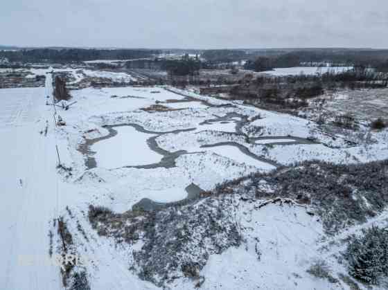 Продаётся инвестиционный объект  земельный участок с действующим карьером и Бауска и Бауский край