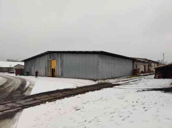 Metal hangar with columns.  Level concrete floor. Inside the hangar there is a 37 sq.m brick buildin Рижский район