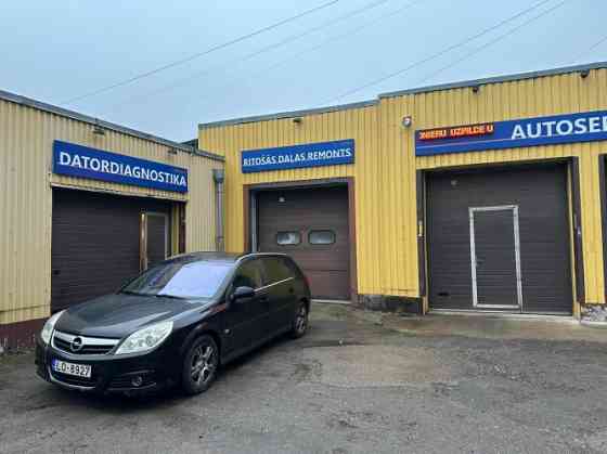 Помещение автосервиса с въездом/подъёмными воротами на Ганибу дамбис. Рига