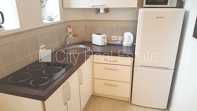 Фасадный дом, лифт, лестничная клетка после косметического ремонта, студио, кухня Рига - изображение 13