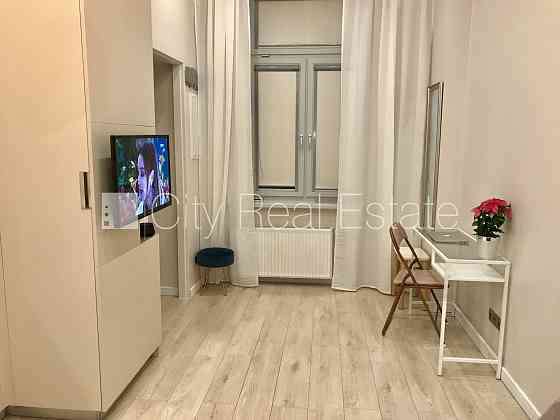 Реновированный дом, закрытый двор, лифт, лестничная клетка после капитального Rīga