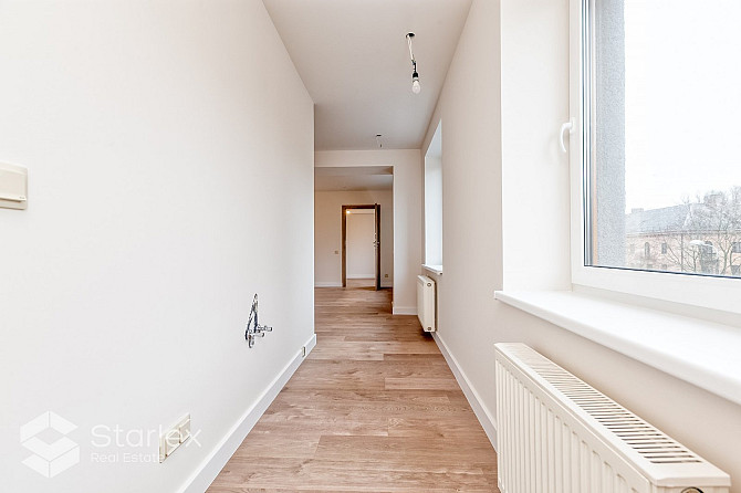 Iegādei pieejams dzīvoklis tikko renovētajā mājā ar lielisku skatu uz Pētersalas un Rīga - foto 19