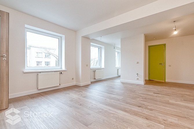 Iegādei pieejams dzīvoklis tikko renovētajā mājā ar lielisku skatu uz Pētersalas un Rīga - foto 16