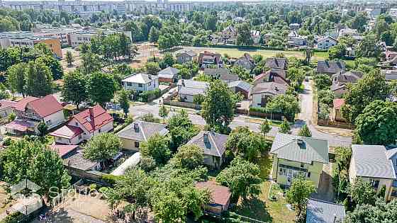 Продается земельный участок с одноэтажным домом и подсобным помещением в Rīga