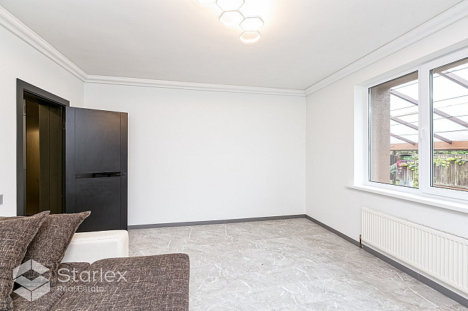 Pārdošanā lielisks divu māju īpašums, kas atrodas uz klusas privātmāju ieskautas ielas Rīga - foto 15