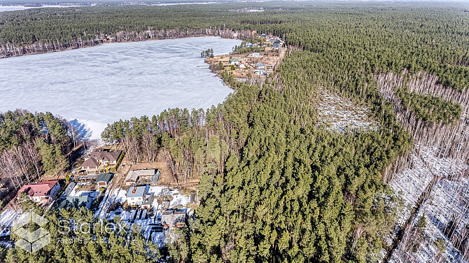 В живописном месте на берегу самого озера Лангстини продается уникальный Рижский район - изображение 20