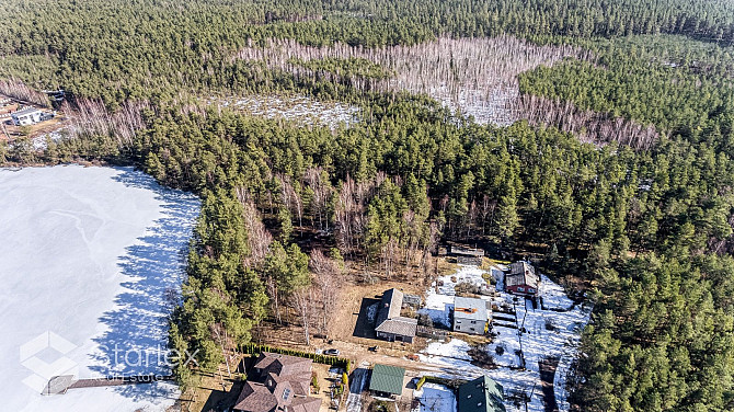 В живописном месте на берегу самого озера Лангстини продается уникальный Рижский район - изображение 17