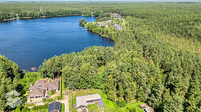В живописном месте на берегу самого озера Лангстини продается уникальный Рижский район - изображение 2