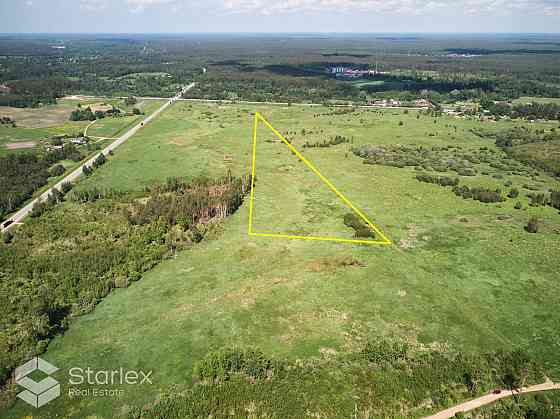 Pārdod lauksaimniecības zemi Salaspils pagastā, blakus A4 Rīgas apvedceļa un P5 autoceļa Ulbroka - O Саласпилс