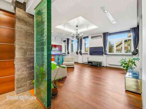 A three-room apartment is available in the center of Riga. The property is located in a green and ra Rīga