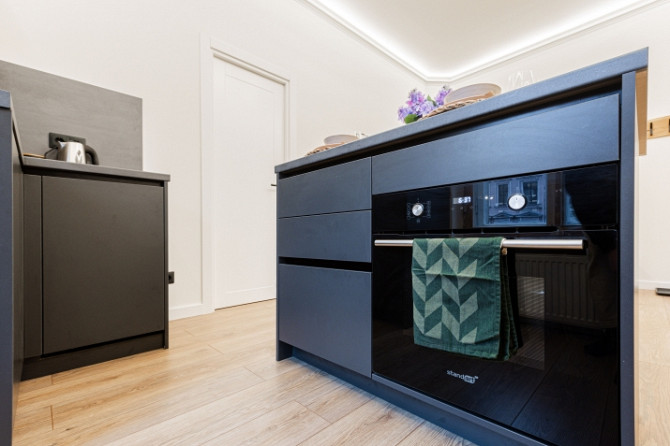 Pieejams ekskluzīvs dzīvoklis īstermiņa īrei Merķeļa ielā 8. Dzīvoklis ir pilnībā Rīga - foto 5