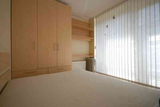 меблированная двухкомнатная квартира-студия в новом проекте Ganibu dambis.  Здание Rīga