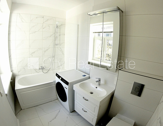 Pagalma ēka, renovēta māja, labiekārtota apzaļumota teritorija, teritorijas iebrauktuves Rīga - foto 20