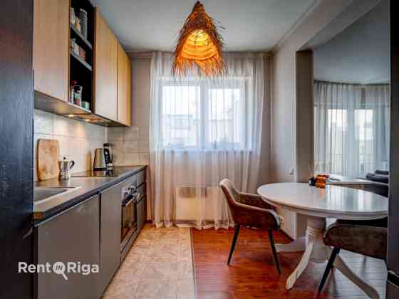 Apartment in a new development with underground parking and a storage room.  The layout includes a l Рига